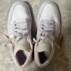 Nike Jordan’s. Women size 8.5. Lilac and gold. Great condition!!